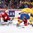 MONTREAL, CANADA - DECEMBER 28: Switzerland's Joren van Pottelgerghe #30 makes a glove save while Sweden's Oliver Kylington #7 and Andreas Wingerli #28 look on during preliminary round action at the 2017 IIHF World Junior Championship. (Photo by Andre Ringuette/HHOF-IIHF Images)

